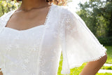 Adelaide mini-jurk van wit katoen met broderie